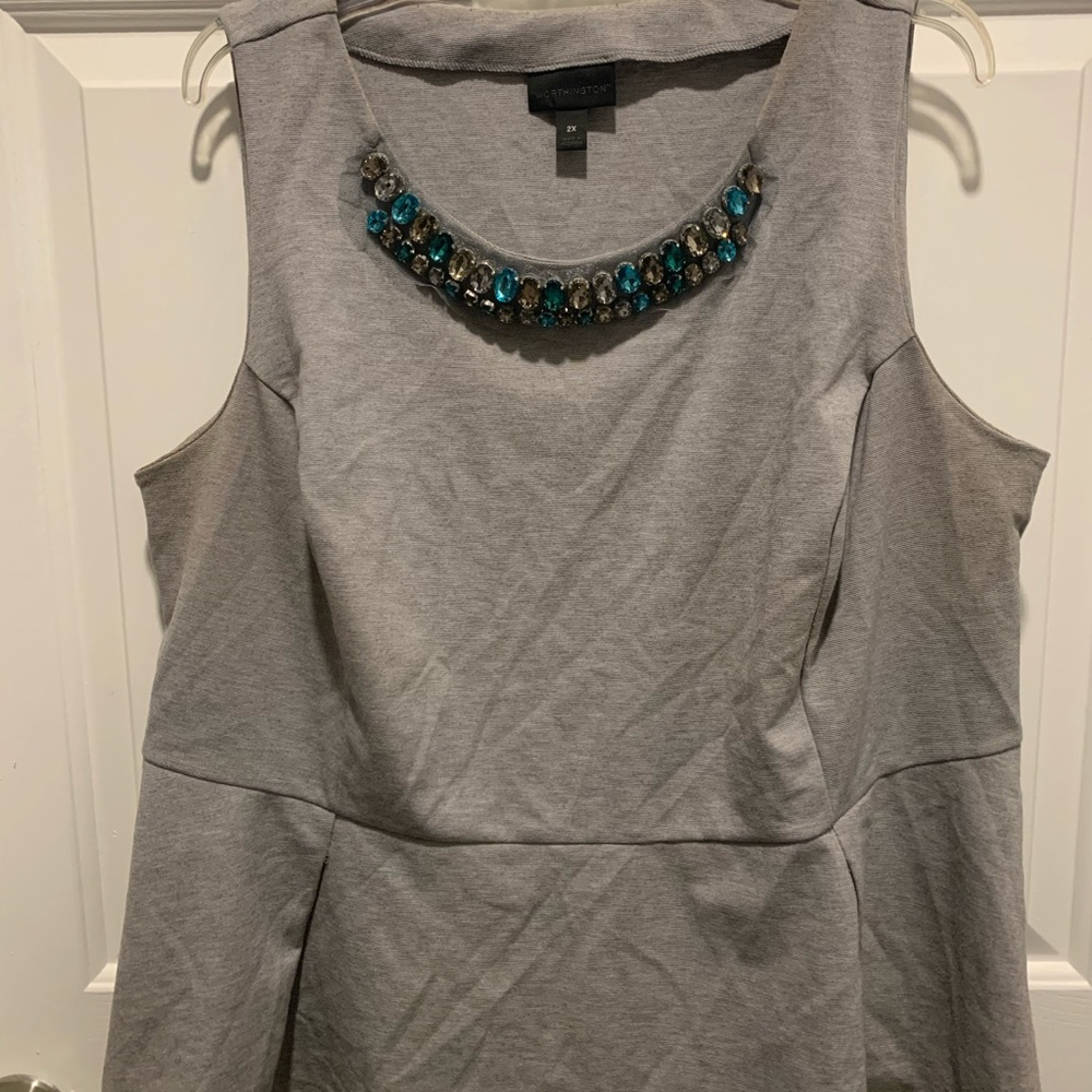 Sleeveless peplum shirt